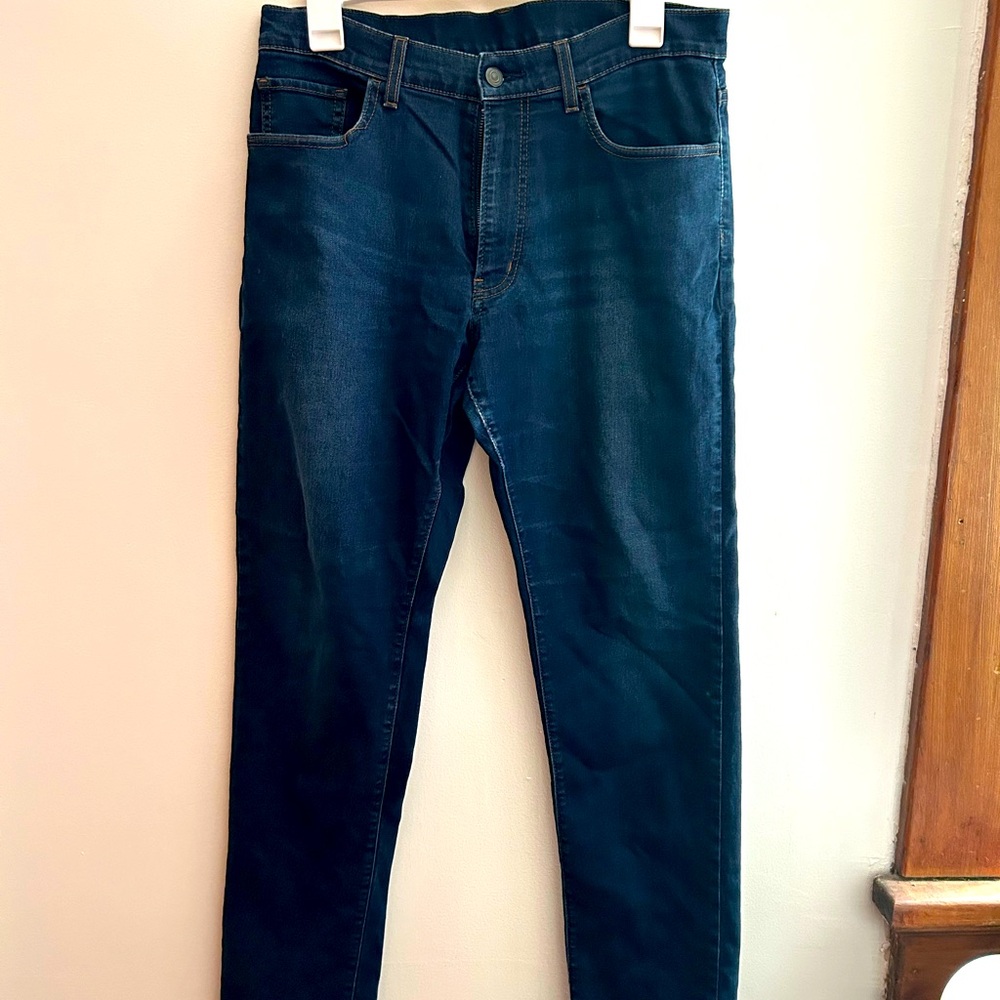 Men’s relaxed fit jeans, 34 by 30.